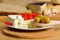 Feta cheese, olives and tomatos on a plate Royalty Free Stock Photo