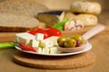 Feta cheese, olives and tomatos on a plate Royalty Free Stock Photo