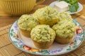Feta and spinach muffins in a plate - Savoury baked muffins background Royalty Free Stock Photo