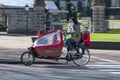 Fetching the kids back from school on bicycle