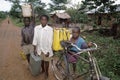 Fetching water by children on endlessly long road Royalty Free Stock Photo