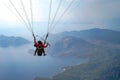 Tandem paragliders on Mediterranean