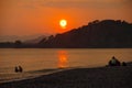 FETHIYE, TURKEY - June, 2019: Sunset on the Calis Beach on the Aegean Sea Royalty Free Stock Photo