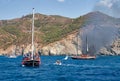 Fire on Turkish yacht in the Mediterranean Sea. Another yacht and boat came to the rescue. Oludeniz,Fethiye,Mugla,Turkey