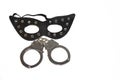 Fetish mask and a handcuff Royalty Free Stock Photo