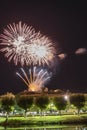 Fireworks at Night over the castle with boats in the river