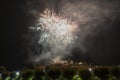 Fireworks at Night over the castle with boats in the river