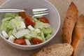 Fetta salad with slices of bread