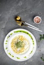 Fettuccine alfredo in a creamy sauce with chicken, parmesan on white plate. Pasta alfredo with chicken. Italian cuisine. vertical Royalty Free Stock Photo