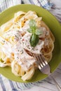 Fettuccine alfredo pasta with chicken closeup. vertical top view Royalty Free Stock Photo