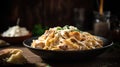 Fettuccine pasta with chicken and cream sauce, selective focus.
