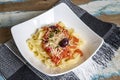 Fettuccine pasta with fresh homemade tomato sauce and parsley Royalty Free Stock Photo
