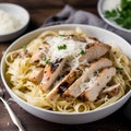 Fettuccine pasta with grilled chicken fillet and parmesan cheese