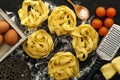 Fettuccine pasta italian food still life rustic over black wood Royalty Free Stock Photo