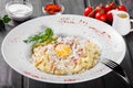 Fettuccine pasta with meat, ham, egg, parmesan cheese, basil Royalty Free Stock Photo