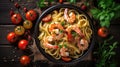 Fettuccine pasta with shrimp tomatoes and herbs. Top view Royalty Free Stock Photo
