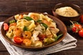 Fettuccine pasta with shrimp and tomatoes on old table Royalty Free Stock Photo