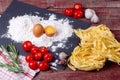 Fettuccine paste, egg, flour, garlic, cherry tomato and rosemary