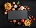 Fettuccine tagliatelle paste and slate board with mushrooms, her Royalty Free Stock Photo