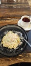 Fettucini carbonara with warm sweet tea as a partner Royalty Free Stock Photo