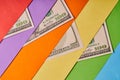 A few American dollars on a colored paper background Royalty Free Stock Photo