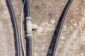 Plastic black water hoses with metal bifurcation element