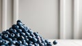 A few blueberries atop a large pile of blueberries. Royalty Free Stock Photo