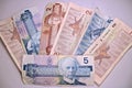 Two dollar bills Canadian five dollar bills Royalty Free Stock Photo