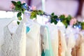 Few elegant wedding, bridesmaid ,evening, ball gown or prom dresses on a hanger in a bridal shop Royalty Free Stock Photo