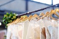 Few elegant wedding, bridesmaid ,evening, ball gown or prom dresses on a hanger in a bridal shop Royalty Free Stock Photo