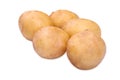 A few fresh and organic new potatoes, isolated on a white background. Raw and hard potatoes full of nutritious vitamins. Royalty Free Stock Photo