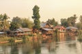 Few home surrounded by the Mekong river