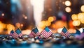 Few little United States flags for Independence Day celebrations. National American symbol on the blurred city backdrop. Close up Royalty Free Stock Photo