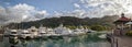 A few luxury yachts at the berth of Eden island