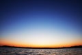 A few minutes before sunrise. deep blue sky over river Royalty Free Stock Photo