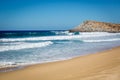 Few people enjoying the early day in Todos Santos beach in Baja California, Mexico Royalty Free Stock Photo