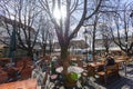 Few People in a german Biergarten Outdoor Beer Pub at the Viktualienmarkt Victuals Market in Munich