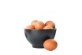 Few raw chicken eggs in bowl Royalty Free Stock Photo