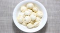 A few raw frozen dumplings in a plate Royalty Free Stock Photo