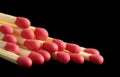 Few red matchsticks on black background Royalty Free Stock Photo