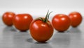 A few red ripe tomatos on a table for healthy nutrition Royalty Free Stock Photo