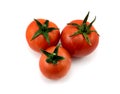 Few red tomatoes isolated on white Royalty Free Stock Photo