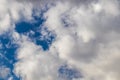 A few small clouds in a clear blue sky. summer bright image of the sky. Royalty Free Stock Photo