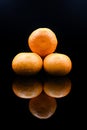 A few stacked fresh oranges Royalty Free Stock Photo