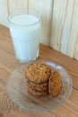 A few stacks of cookies and a glass of fresh milk Royalty Free Stock Photo