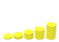 A few stacks of yellow coins showing increasing earnings or savings from left to right white backdrop Royalty Free Stock Photo