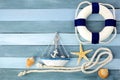 Few summer marine items on a wooden background. Royalty Free Stock Photo