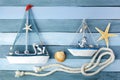 Few summer marine items on a wooden background. Royalty Free Stock Photo