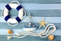 Few summer marine items on a wooden background.