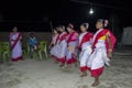 Few tribal women dancing wearing traditional sari with selective focus Royalty Free Stock Photo